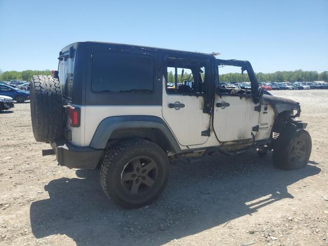 Photo 3 from auction – 2011 JEEP WRANGLER U with VIN 1J4BA3H1XBL539032