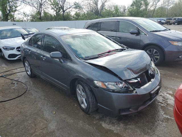 Photo 4 from auction – 2011 HONDA CIVIC LX-S with VIN 19XFA1F65BE007058