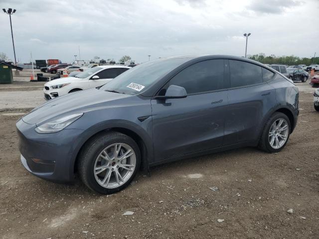 TESLA MODEL Y 2022 with VIN 7SAYGDEE9NA017057 - Photo from auction