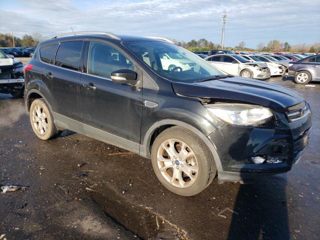 Foto 4 de la subasta – 2014 FORD ESCAPE TIT con VIN 1FMCU0J94EUC90236