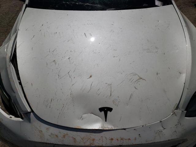 Photo 11 from auction – 2023 TESLA MODEL Y with VIN 7SAYGDEE7PF815529