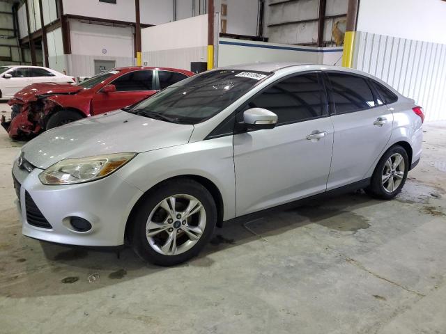 FORD FOCUS SE 2014 with VIN 1FADP3F28EL181027 - Photo from auction