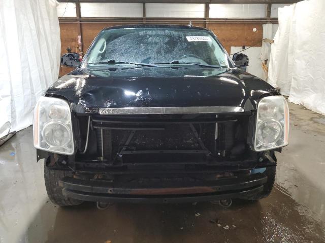Фото 5 с аукциона – 2011 GMC YUKON SLE с VIN 1GKS2AE01BR124279