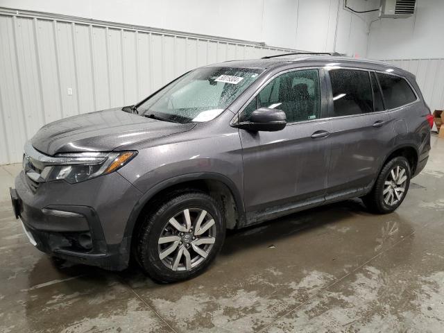 HONDA PILOT EXL 2020 with VIN 5FNYF6H59LB025571 - Photo from auction