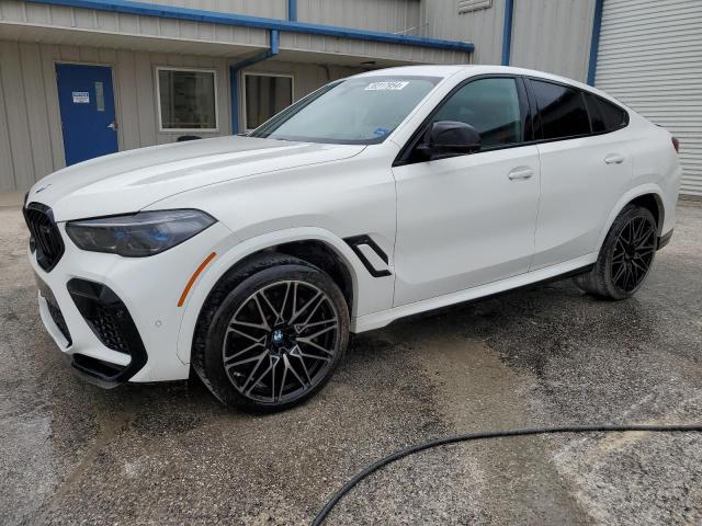 BMW X6 M 2022 with VIN 5YMCY0C08N9K52980 - Photo from auction