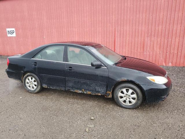 Photo 4 from auction – 2002 TOYOTA CAMRY LE with VIN JTDBF32K720044443