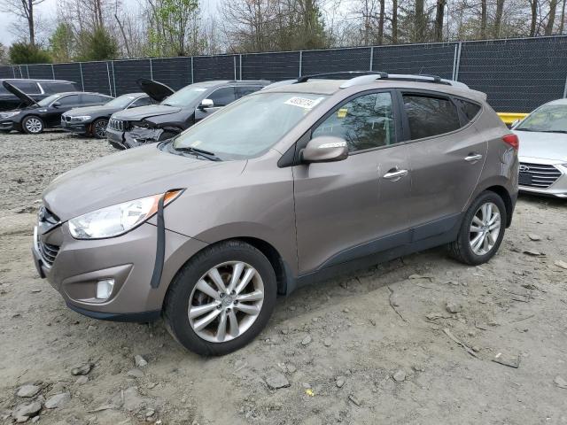 HYUNDAI TUCSON GLS 2011 with VIN KM8JUCAC9BU309718 - Photo from auction