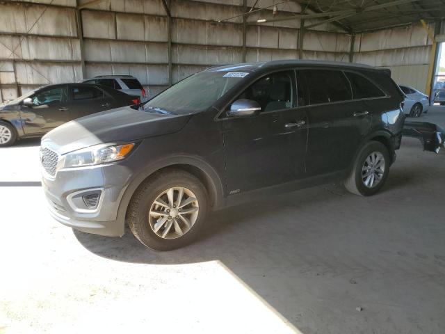 KIA SORENTO LX 2016 with VIN 5XYPGDA33GG166544 - Photo from auction