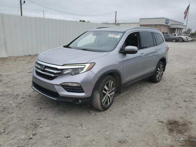 HONDA PILOT ELIT 2016 with VIN 5FNYF6H06GB098021 - Photo from auction
