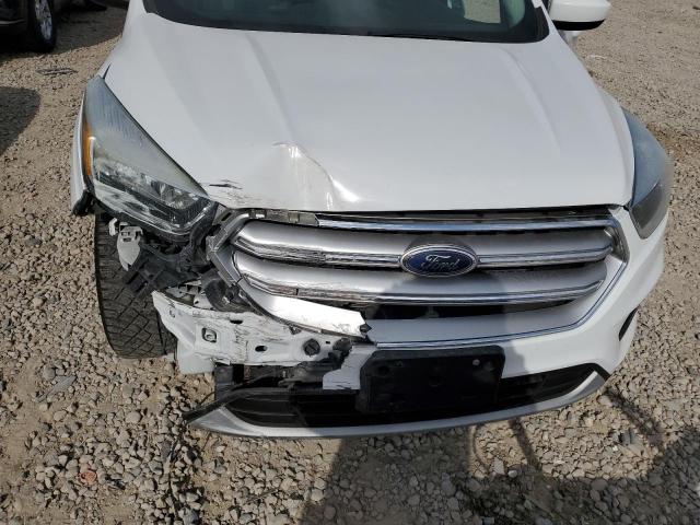 Photo 11 from auction – 2017 FORD ESCAPE SE with VIN 1FMCU9GD8HUA41118
