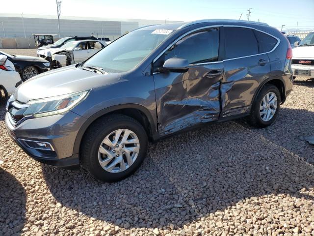 Photo 1 from auction – 2015 HONDA CR-V EXL with VIN 2HKRM4H75FH613229