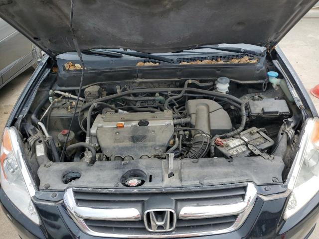 Photo 11 from auction – 2004 HONDA CR-V LX with VIN JHLRD68434C004895