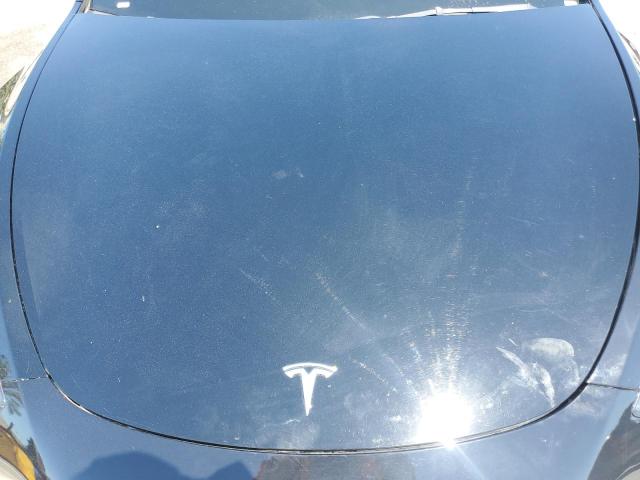 Photo 11 from auction – 2022 TESLA MODEL Y with VIN 7SAYGDEE2NF480578