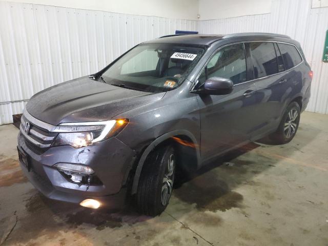 HONDA PILOT EXL 2017 with VIN 5FNYF6H52HB046754 - Photo from auction