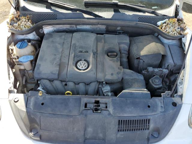 Photo 11 from auction – 2014 VOLKSWAGEN BEETLE with VIN 3VWFP7AT0EM623885