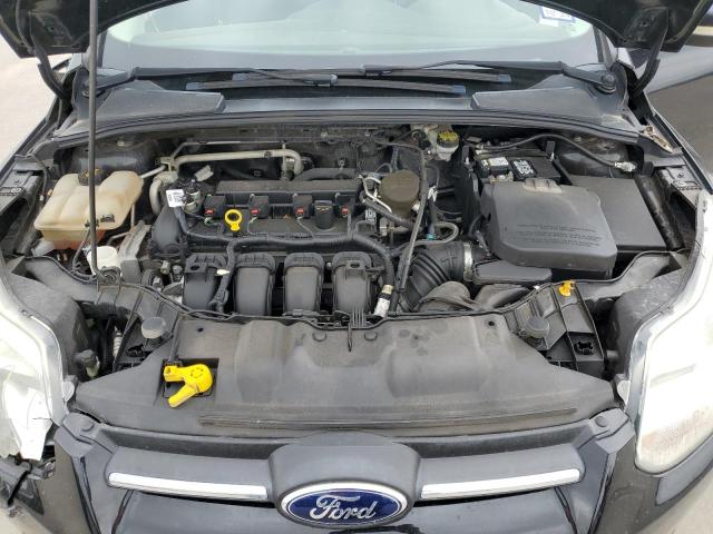 Foto 11 de la subasta – 2014 FORD FOCUS SE con VIN 1FADP3K26EL451880