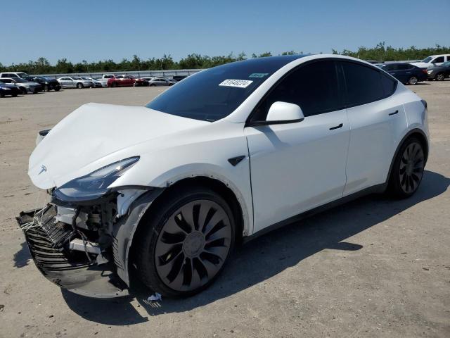TESLA MODEL Y 2023 with VIN 7SAYGDEF4PF702002 - Photo from auction