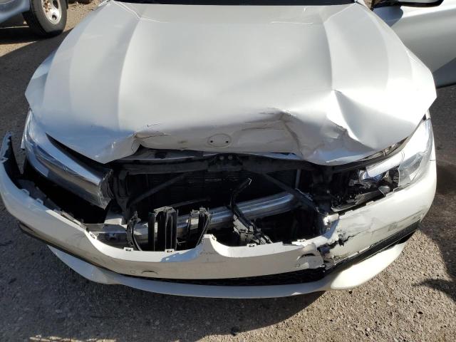 Photo 11 from auction – 2019 BMW 740 I with VIN WBA7E2C51KB454202