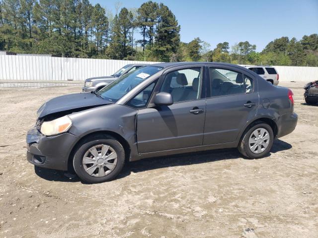 SUZUKI SX4 LE 2010 with VIN JS2YC5A2XA6301841 - Photo from auction