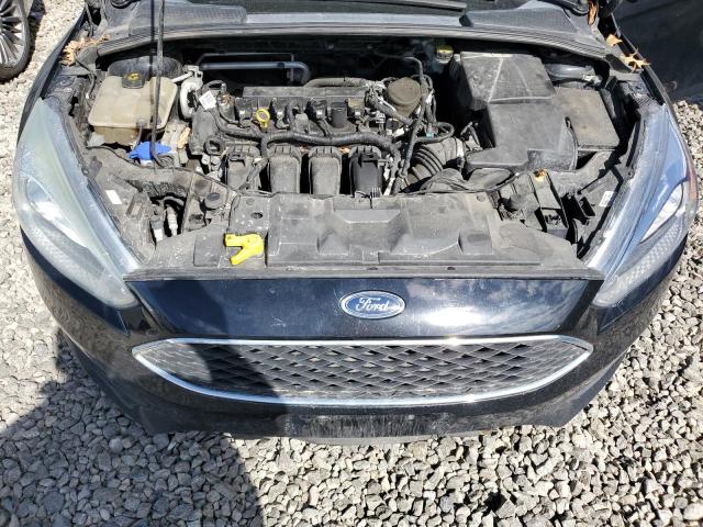 Photo 11 from auction – 2016 FORD FOCUS SE with VIN 1FADP3F22GL289923