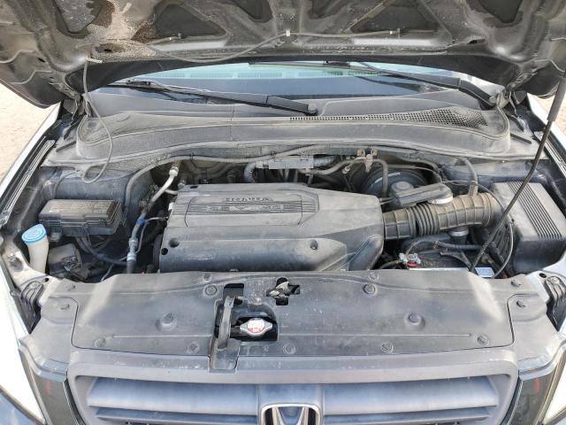 Photo 11 from auction – 2004 HONDA PILOT EXL with VIN 2HKYF18594H622287
