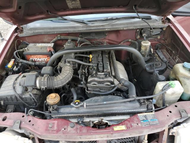 Photo 12 from auction – 2003 CHEVROLET TRACKER with VIN 2CNBE13C136936500