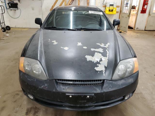 Photo 5 from auction – 2003 HYUNDAI TIBURON with VIN KMHHM65D03U037970