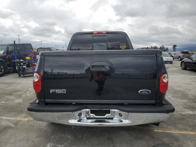 Photo 6 from auction – 2003 FORD F150 with VIN 1FTRX07W43KD03790