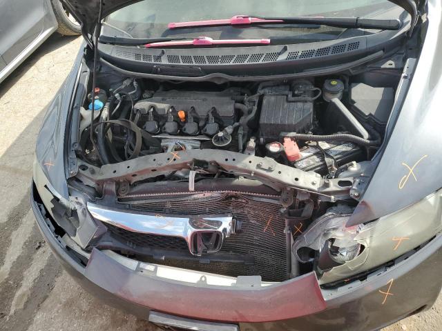 Photo 11 from auction – 2011 HONDA CIVIC LX-S with VIN 19XFA1F65BE007058