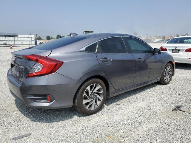 Photo 3 from auction – 2018 HONDA CIVIC EX with VIN 19XFC2F75JE209177