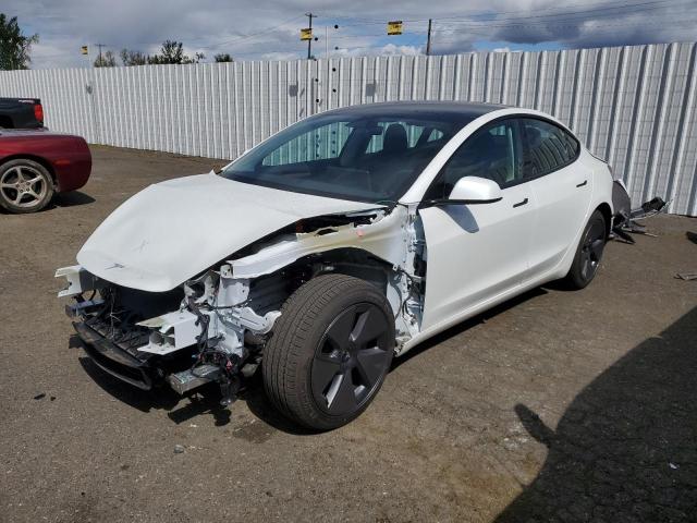 TESLA MODEL 3 2023 with VIN 5YJ3E1EAXPF477973 - Photo from auction