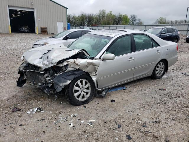 TOYOTA CAMRY LE 2004 with VIN 4T1BF30K24U071642 - Photo from auction