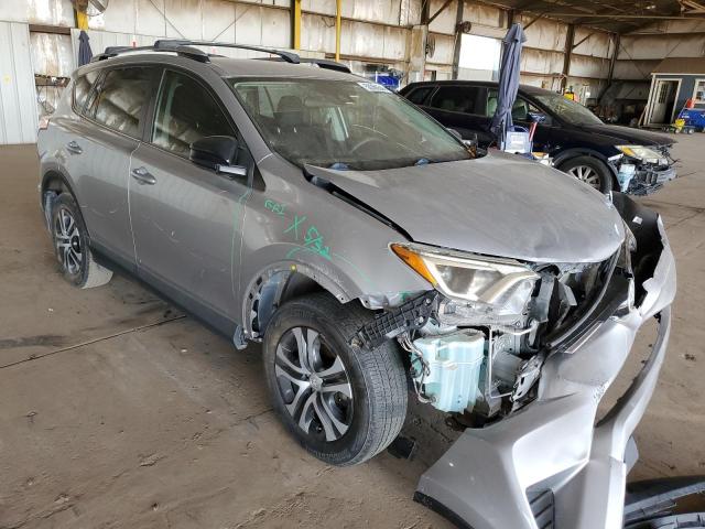 Photo 4 from auction – 2018 TOYOTA RAV4 LE with VIN JTMZFREV2JJ174548