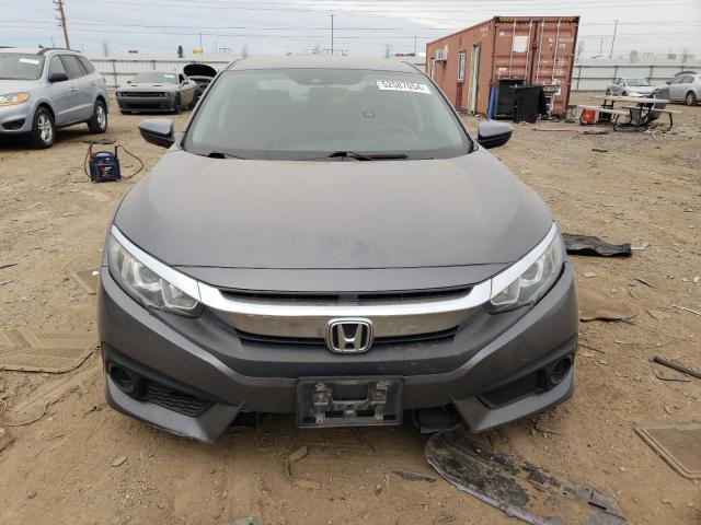 Photo 5 from auction – 2017 HONDA CIVIC LX with VIN 19XFC2F61HE034136