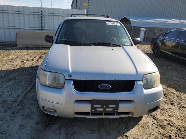 Photo 5 from auction – 2003 FORD ESCAPE LIM with VIN 1FMCU94143KC75769
