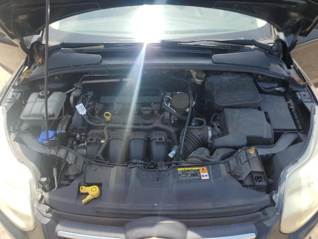 Foto 11 de la subasta – 2014 FORD FOCUS SE con VIN 1FADP3F21EL151402