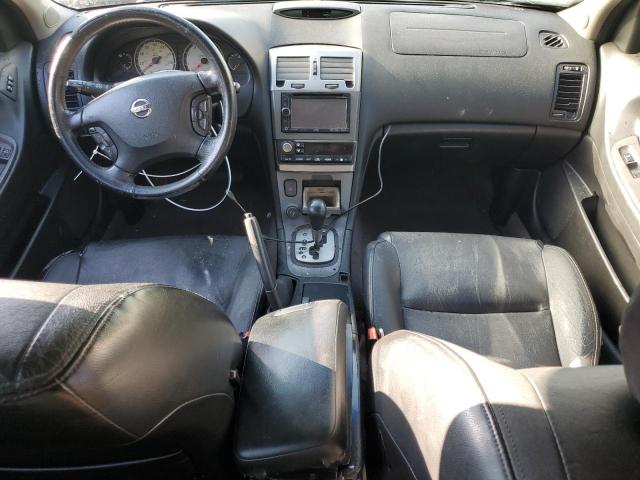 Photo 8 from auction – 2003 NISSAN MAXIMA GLE with VIN JN1DA31A23T417522