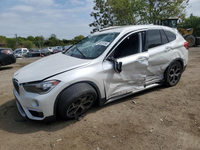 BMW X1 XDRIVE2 2018 with VIN WBXHT3C39J5L33998 - Photo from auction