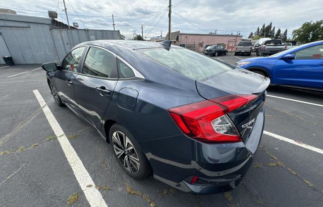 Photo 3 from auction – 2018 HONDA CIVIC EX with VIN JHMFC1F81JX034198