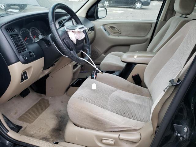 Photo 7 from auction – 2003 MAZDA TRIBUTE LX with VIN 4F2YZ94123KM45140