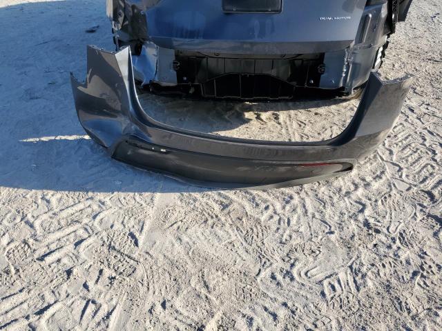 Photo 12 from auction – 2023 TESLA MODEL Y with VIN 7SAYGDEE1PF878545