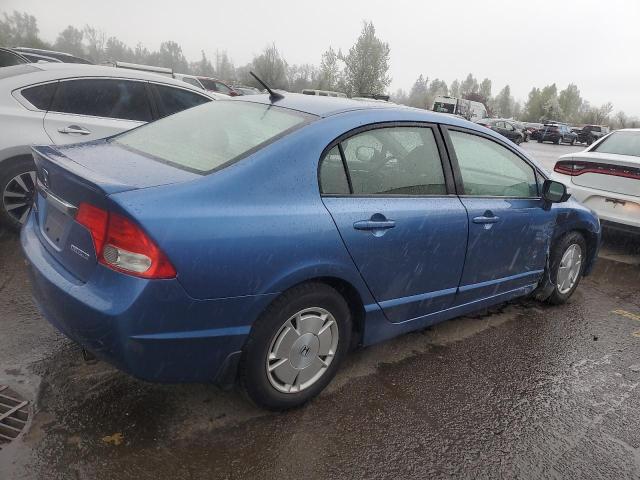 Photo 3 from auction – 2010 HONDA CIVIC HYBR with VIN JHMFA3F22AS006954