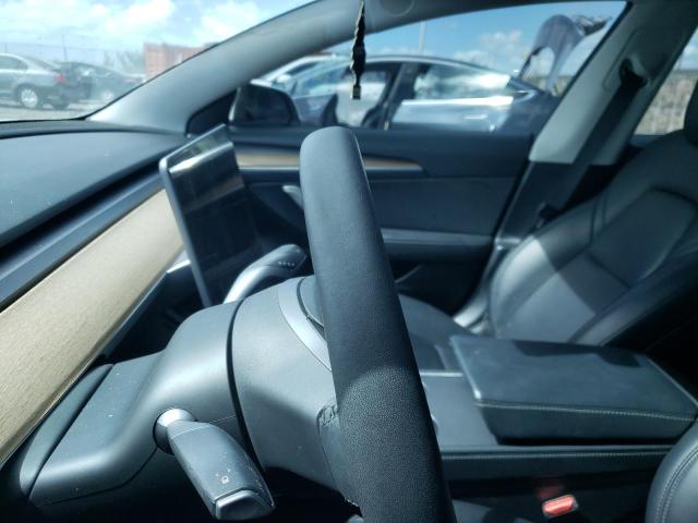 Photo 9 from auction – 2021 TESLA MODEL 3 with VIN 5YJ3E1EA0MF987843