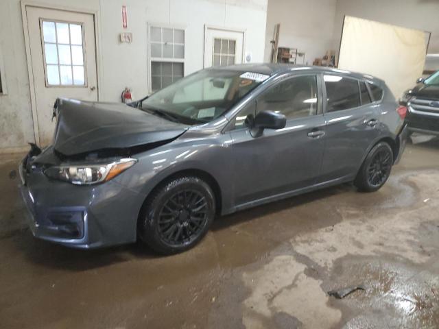 SUBARU IMPREZA 2018 with VIN 4S3GTAA64J3752542 - Photo from auction