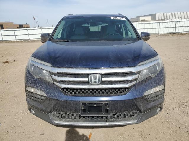 Photo 5 from auction – 2017 HONDA PILOT TOUR with VIN 5FNYF6H90HB093140