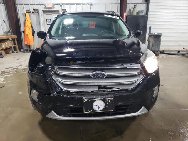 Photo 5 from auction – 2017 FORD ESCAPE SE with VIN 1FMCU9G94HUD33022