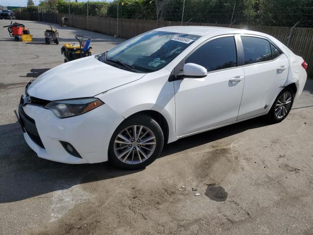 TOYOTA COROLLA L 2014 with VIN 5YFBURHE3EP176829 - Photo from auction