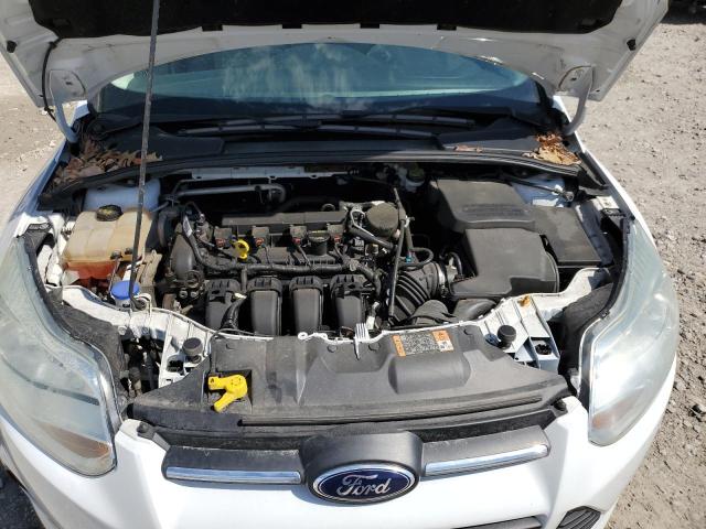 Photo 11 from auction – 2014 FORD FOCUS SE with VIN 1FADP3F24EL357720