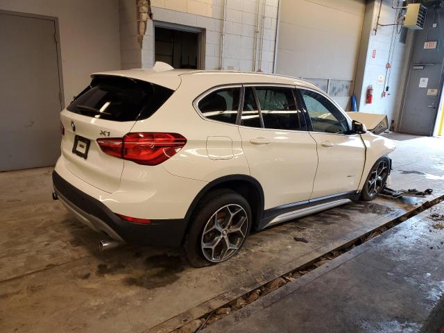 Photo 3 from auction – 2018 BMW X1 XDRIVE2 with VIN WBXHT3C37J5K29591