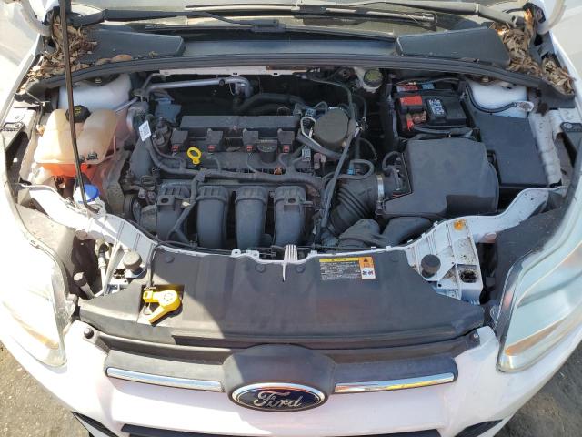 Photo 11 from auction – 2014 FORD FOCUS SE with VIN 1FADP3F21EL125253